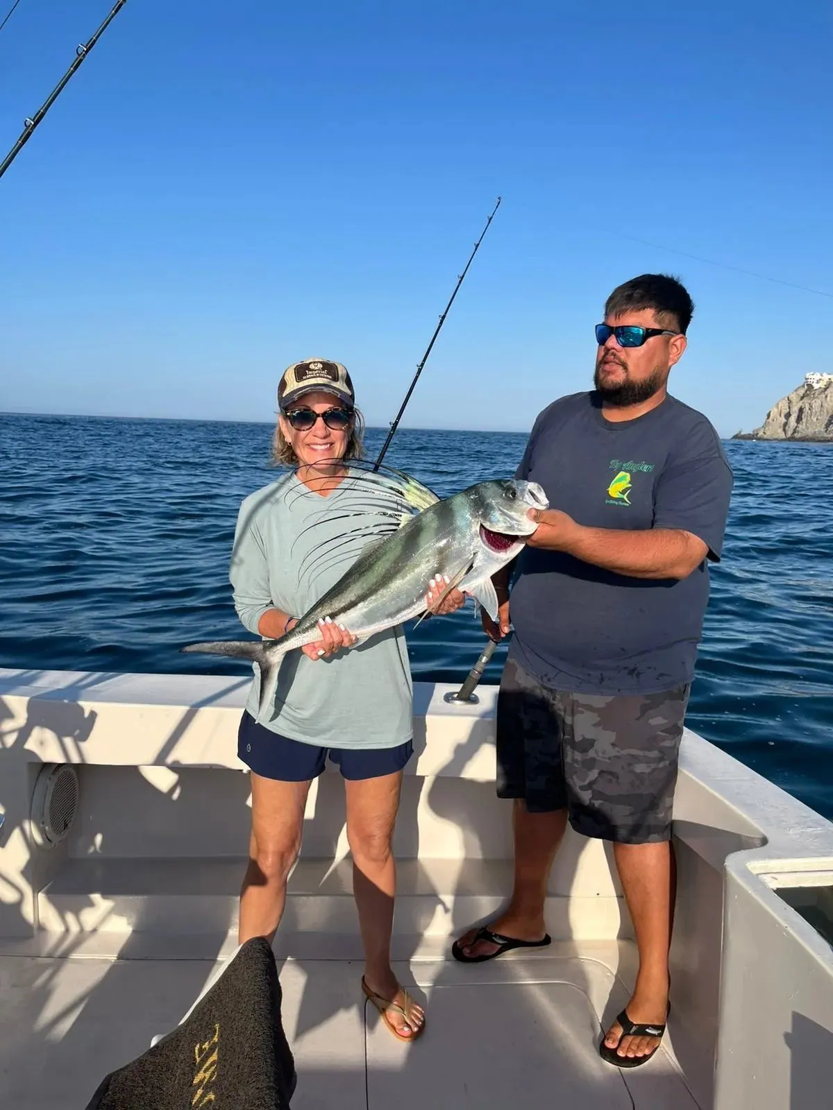 Couple with a fish, May 2025