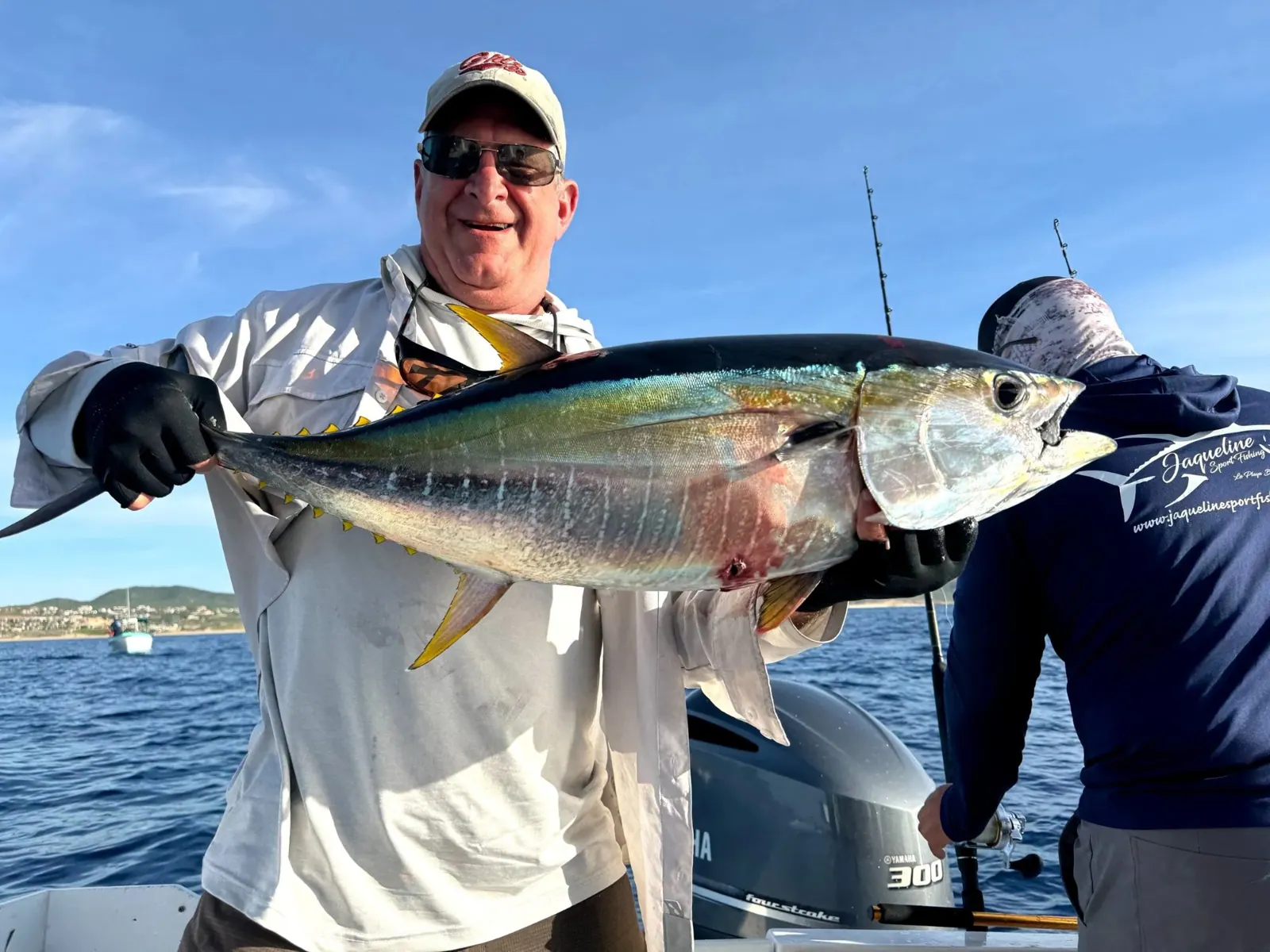 Angler with a yellowfin tuna, November 2025