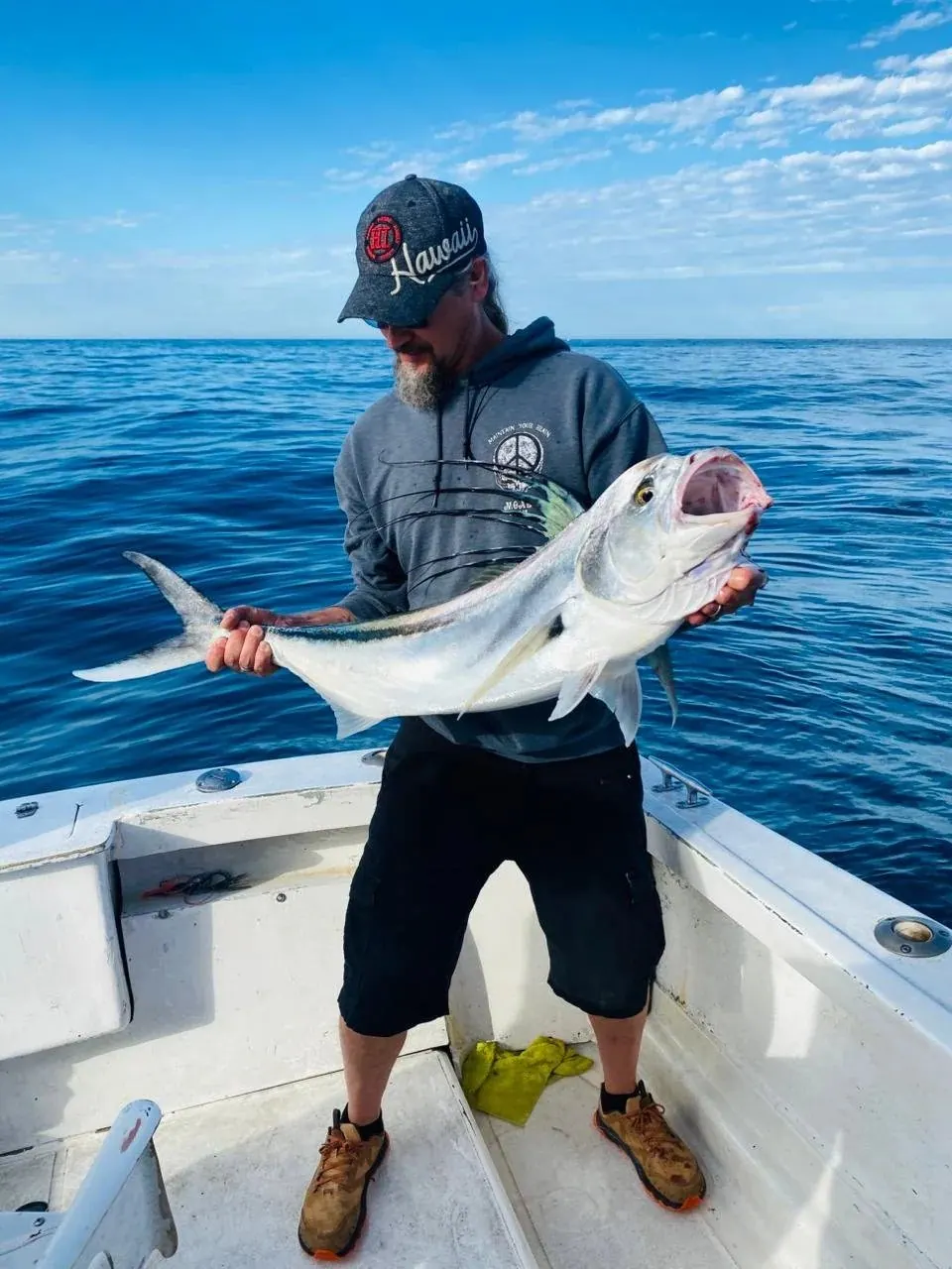 Angler with a roosterfish, February 2026