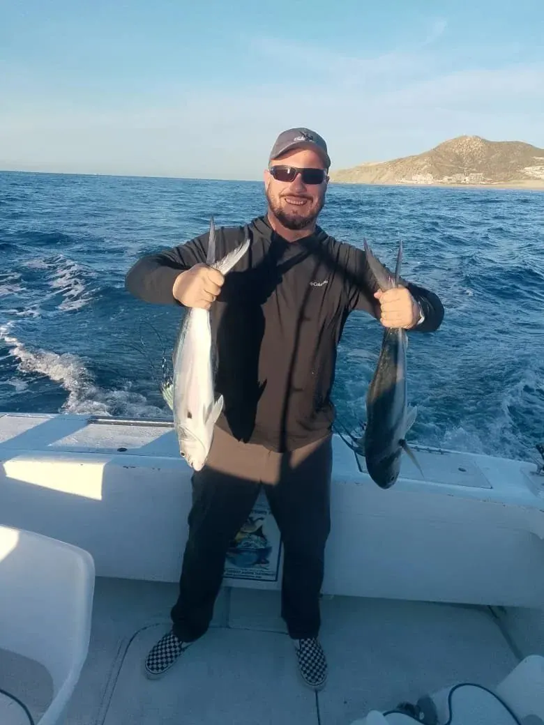 Angler with two fish, December 2025