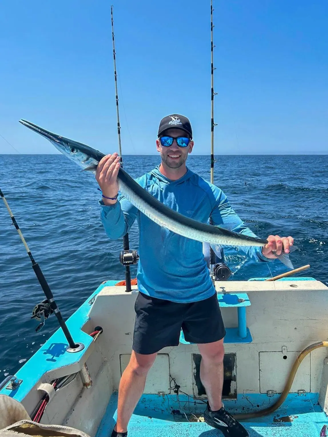 Angler with a needlefish, late May 2025