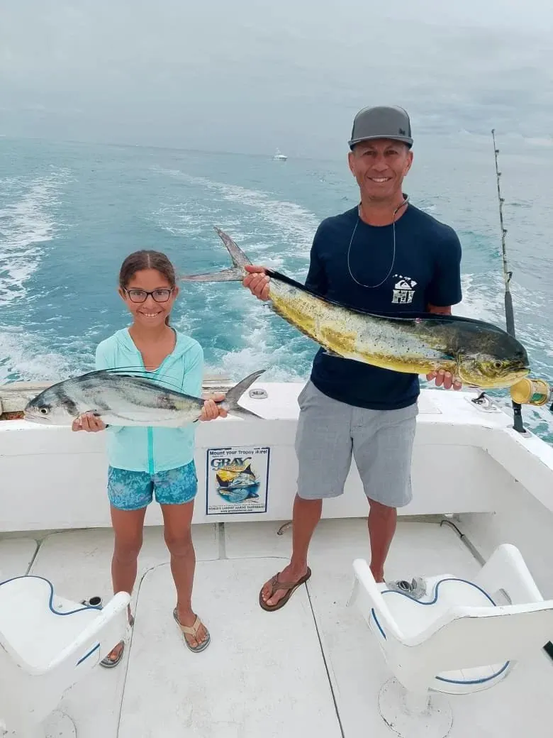 Father and daughter, dorado and roosterfish · Top Anglers guests in Cabo San Lucas
