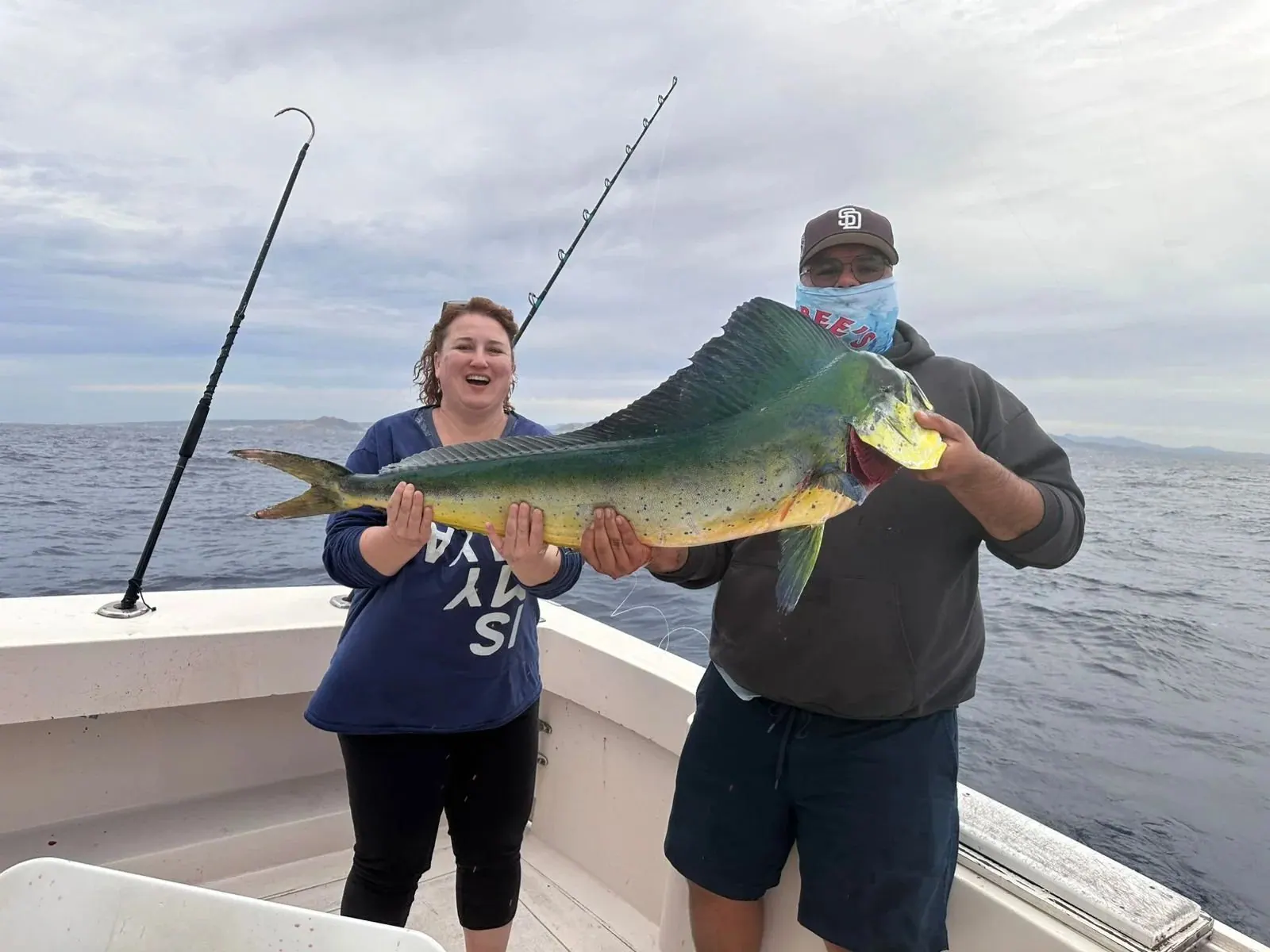 Couple with a dorado, January 2026