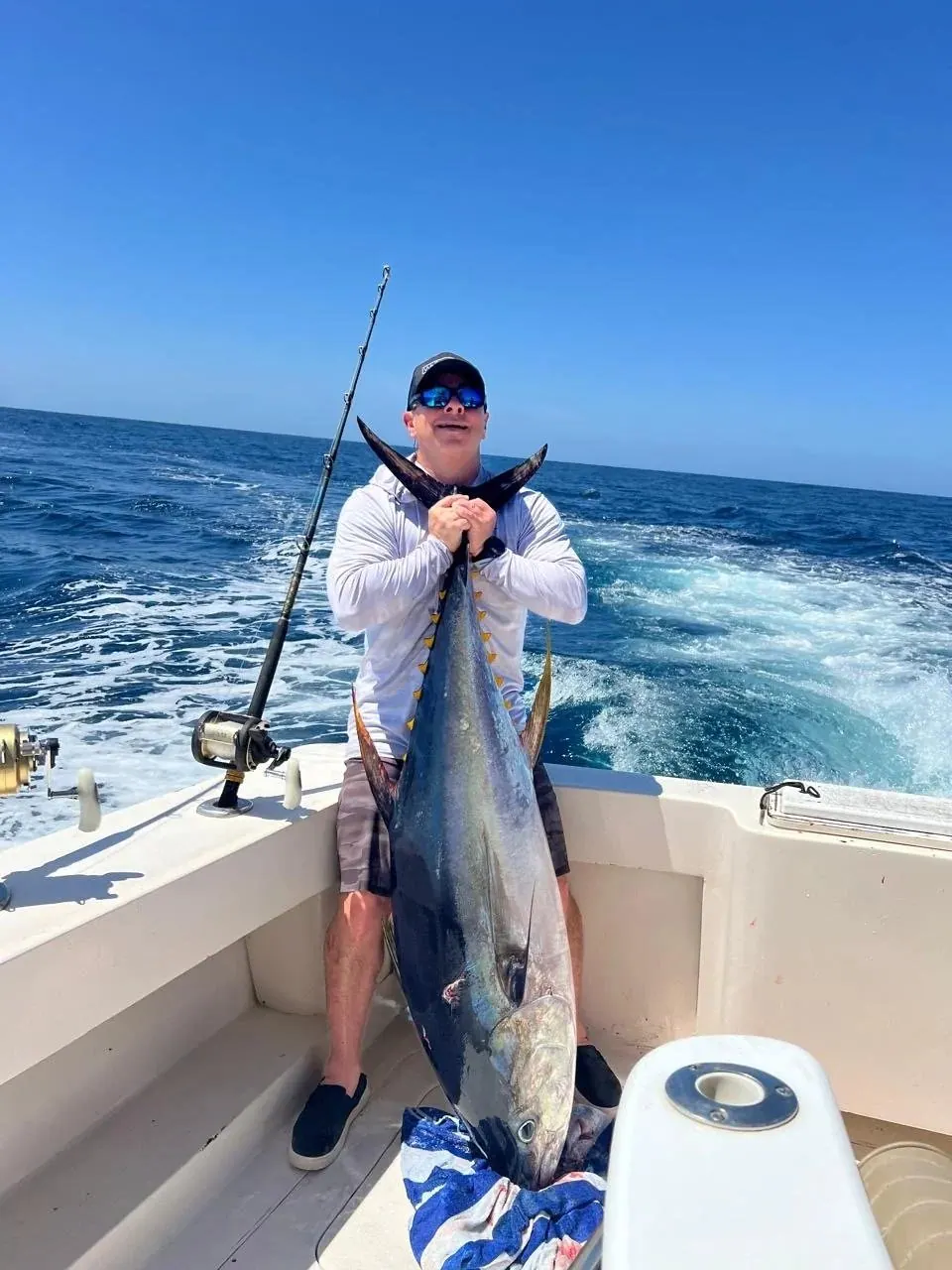 Angler with a yellowfin tuna, May 2025
