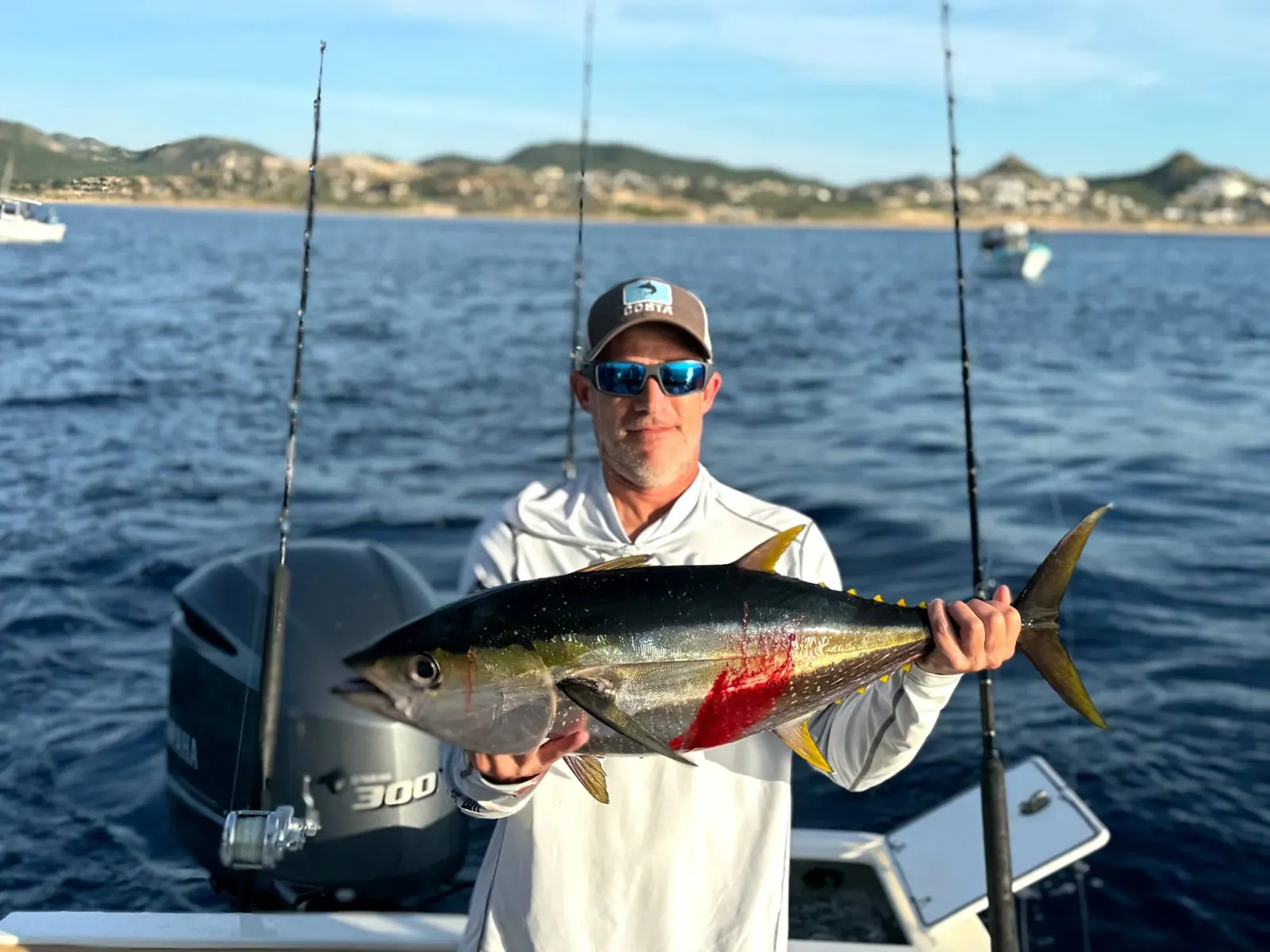 Angler with a yellowfin tuna, November 2025