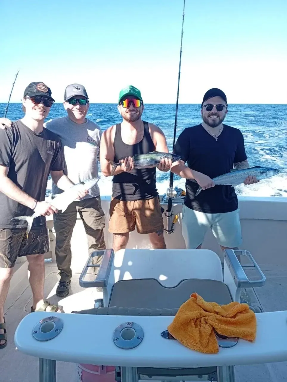 Group of friends with their catch, February 2026