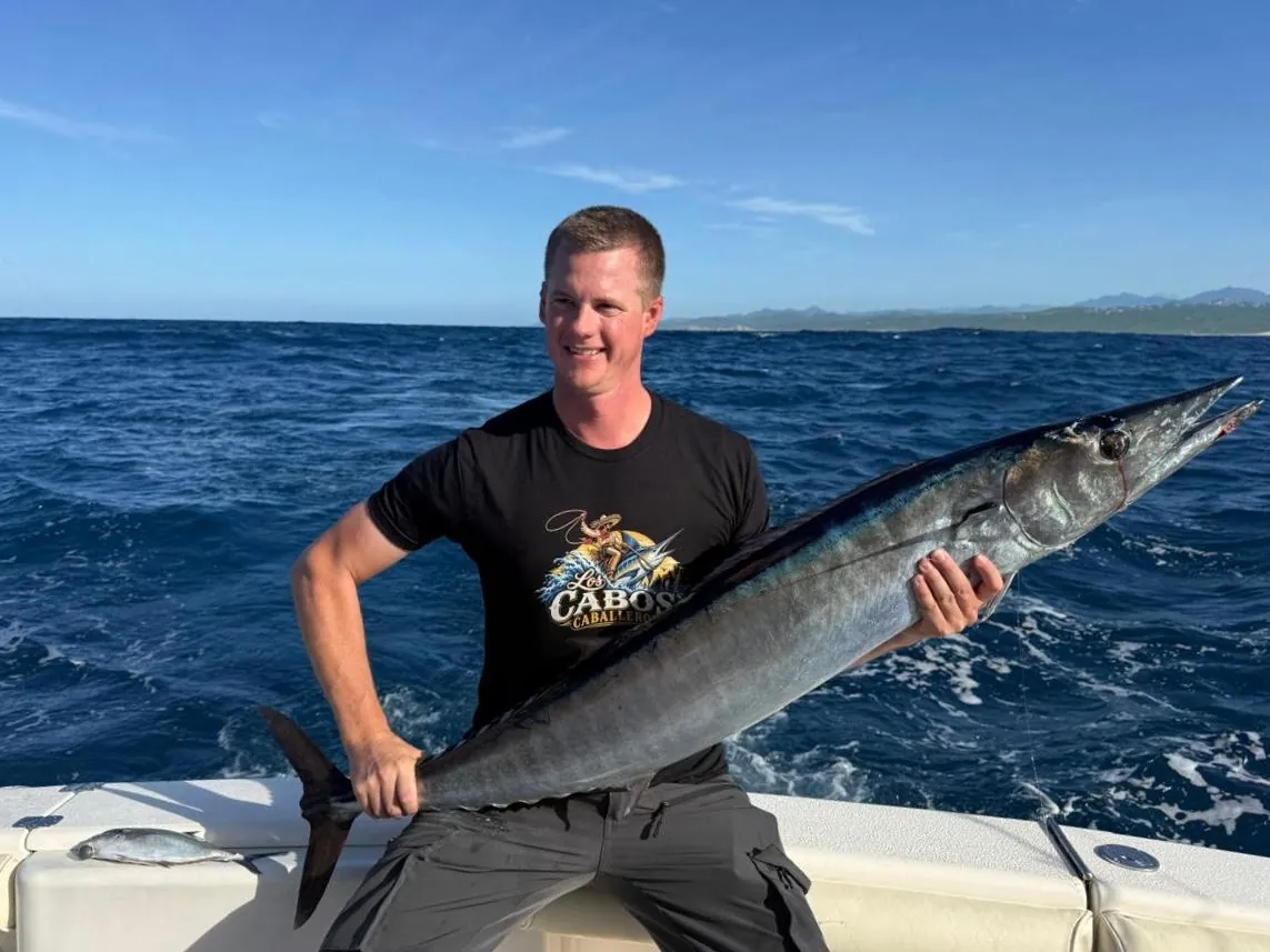 Angler with a wahoo, October 2026