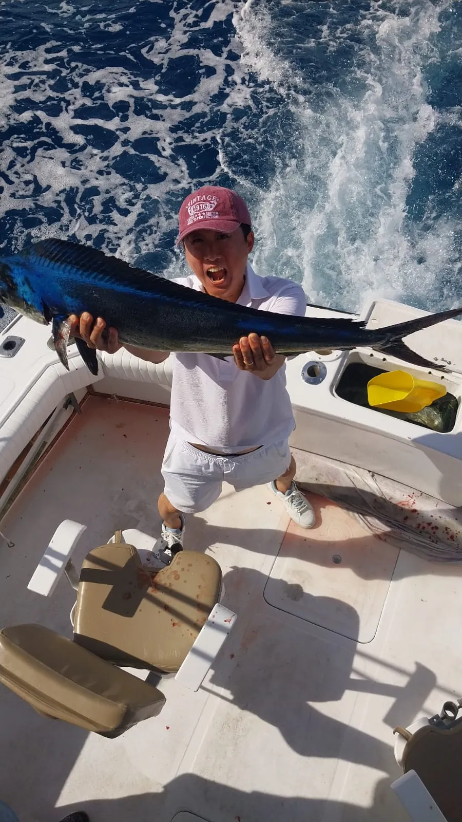 Angler with a dorado in the cockpit, October 2026