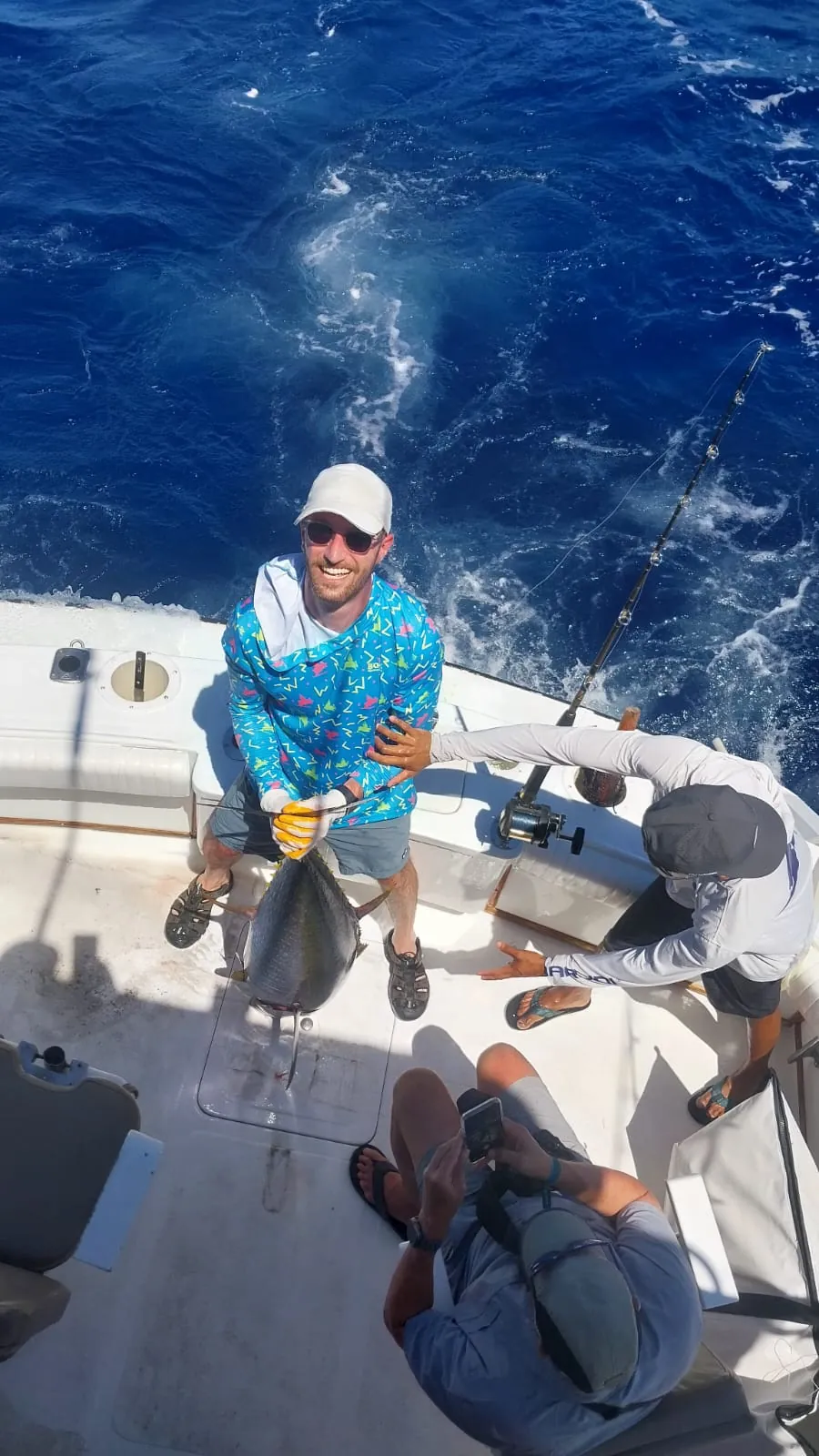 Angler with a tuna in the cockpit, October 2026