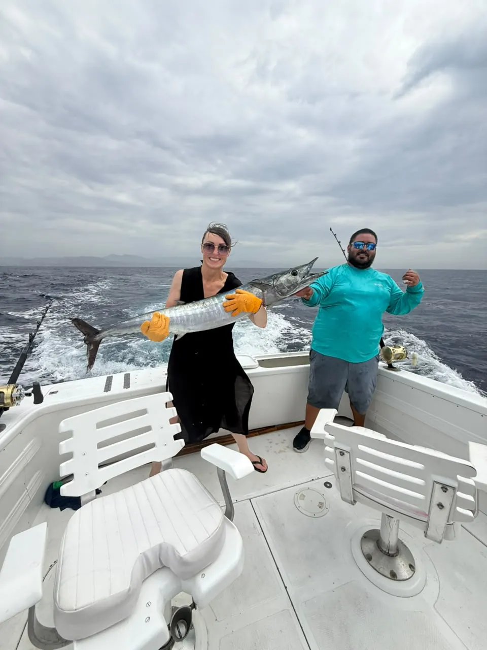 Angler with a wahoo, late July 2026
