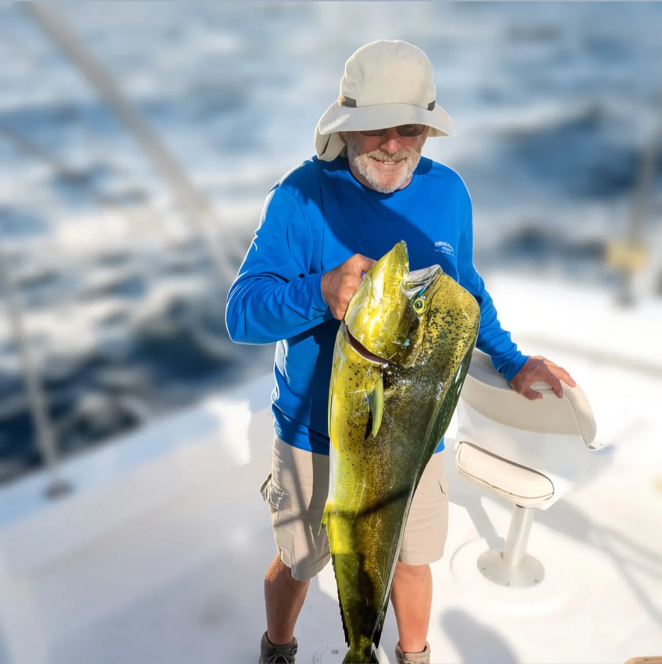 Angler with a dorado, late June 2026